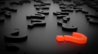 Signos de interrogación sobre una superficie.