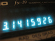 Calculadora científica mostrando el número PI 3.1415926.