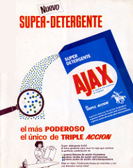 Una caja de detergente con ampliación de las partículas del mismo.