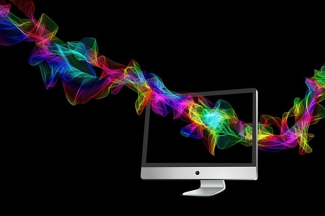 Imagen que muestra una onda de colores atravesando un monitor