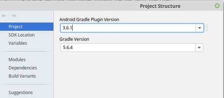 Se muestra el cuadro de diálogo  Project Structure en Android Studio. En el mismo, está seleccionada en el menú la opción Project -> Project Structure, y muestra un cuadro de texto etiquetado como Android Gradle Plugin Version cuyo contenido es 3.6.1 y otro cuadro de texto etiquetado cmo Gradle Version, cuyo contenido es 5.6.4.